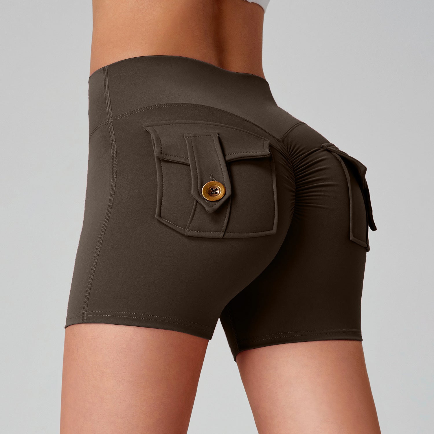 Women quick dry running leggings in a stylish design with pocket detailing and ruching, perfect for activewear.